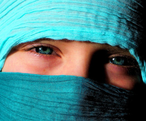 Girl in a Turquoise Mask
